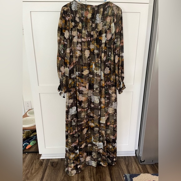 Long sleeve maxi dress by Anthropologie. Black w/ multi colors and gold accents. - Picture 2 of 3